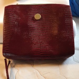 Estee Lauder makeup travel bag.